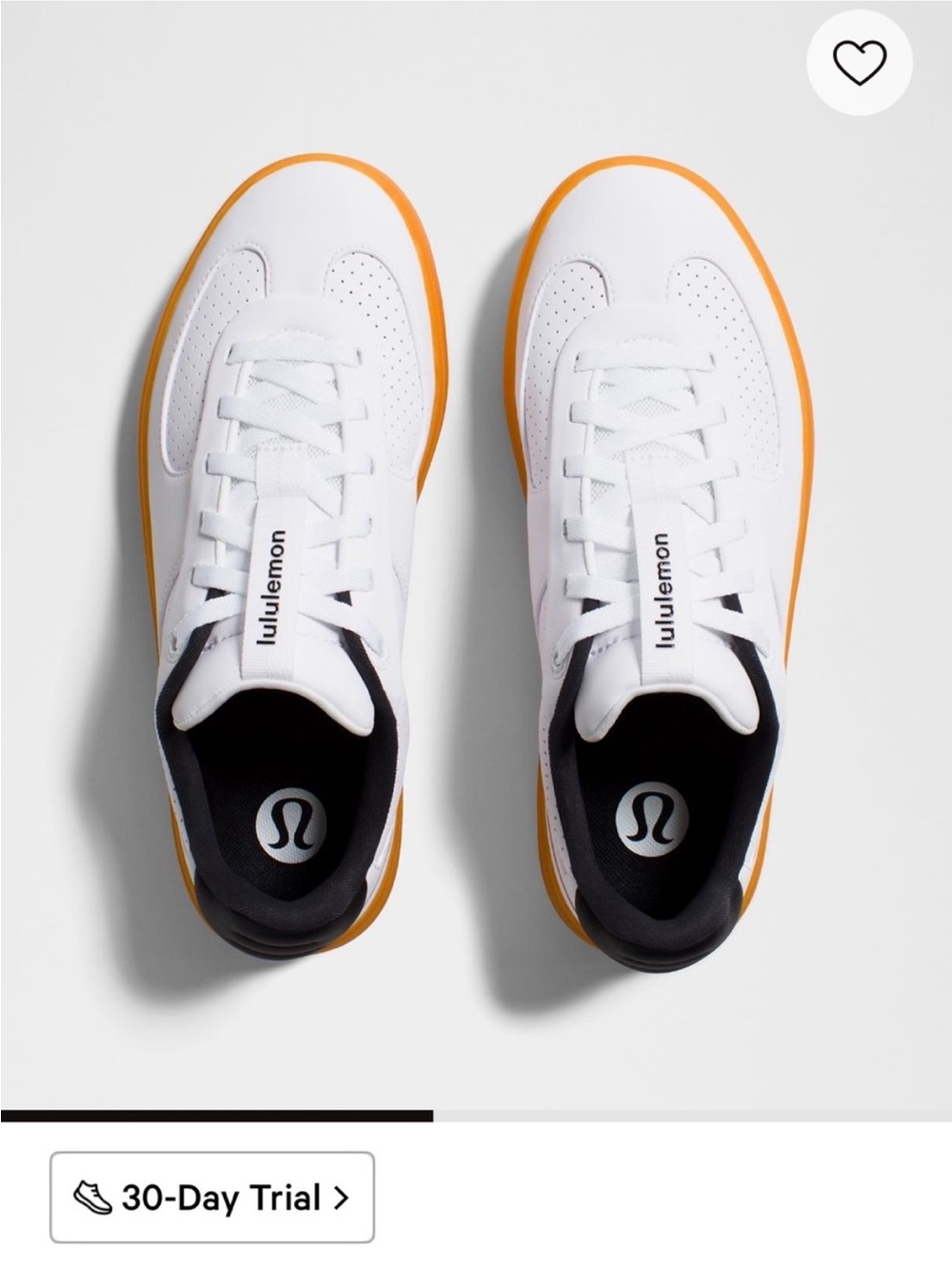 lululemon athletica Women's Low-Top Sneakers in White and Navy with Gum Sole.